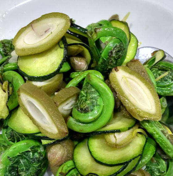 Sauteed Fiddlehead Fern with Pickled Green Almonds and Courgette